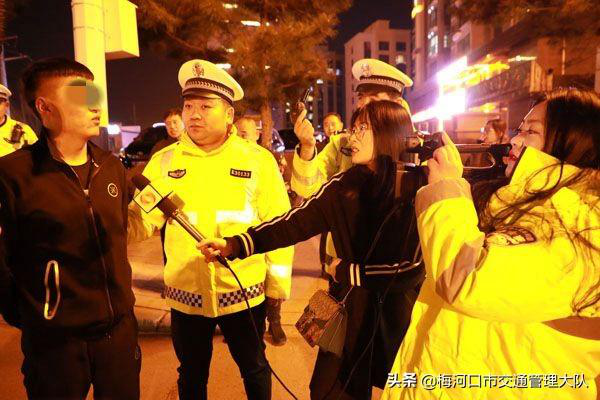 梅河口市交警大队邀请中国交通频道电视台记者随警作战开展夜查酒驾统一行动